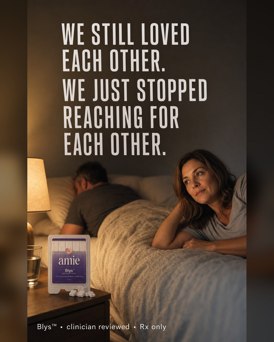 Married woman awake beside her sleeping husband with Blys by Amie